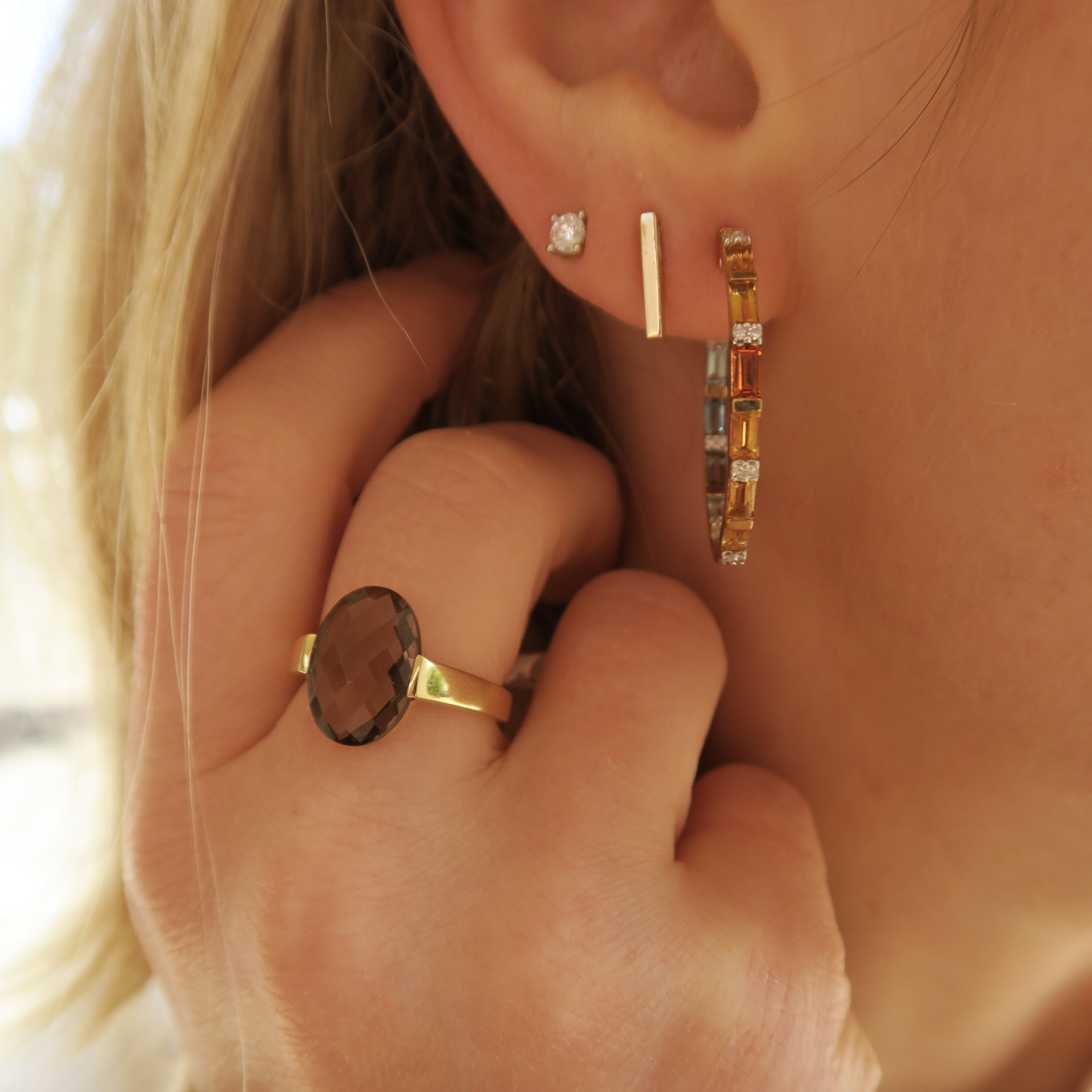 Smokey quartz ring with yellow gold band and coloured gemstone hoop earrings. Fine jewellery from a family business in Melbourne.